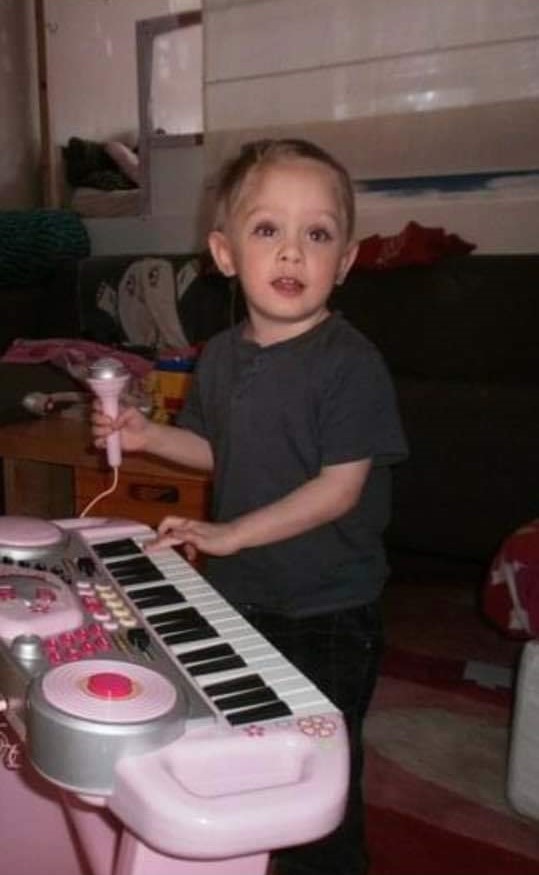 little me playing the keyboard